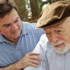 Caregiver supporting an elderly person