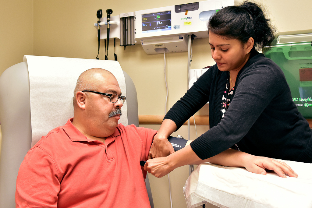 A Veteran having his blood pressure taken